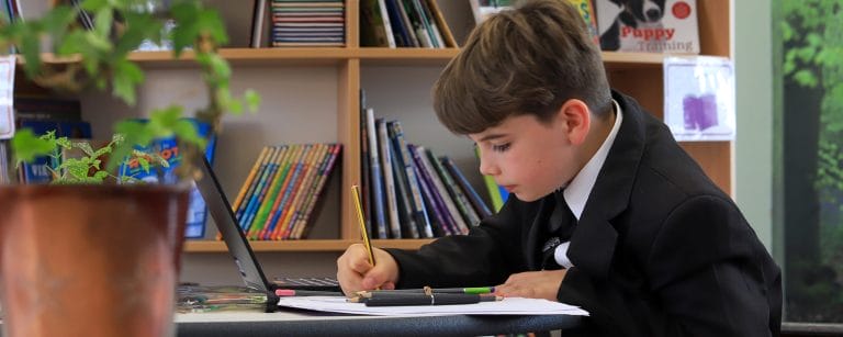 Male doing homework